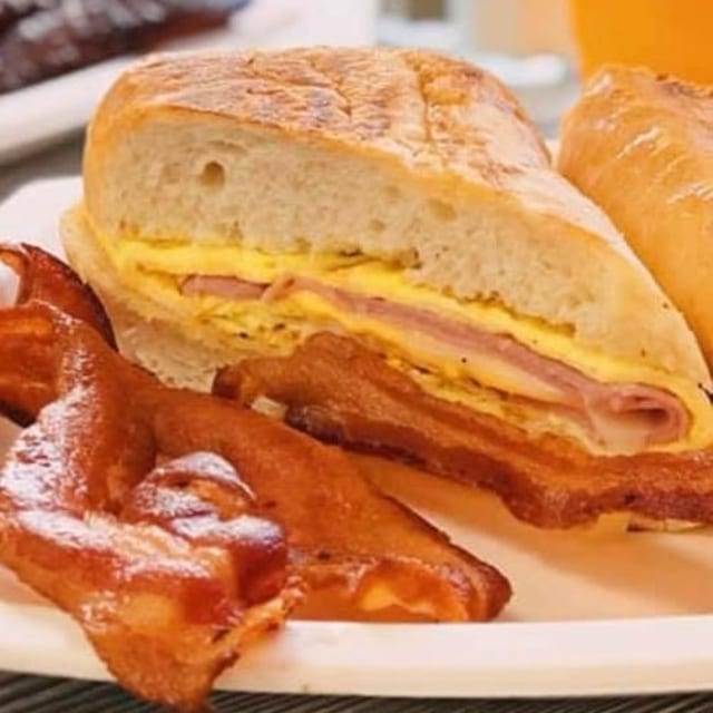 Breakfast Sandwich with Eggs, Cheese and Meat.